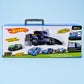 Hot Wheels DIY Toys Large Mobile Garage toy set in its original retail packaging, featuring a blue and white semi-truck garage with illustrations of various toy cars on a light blue background.