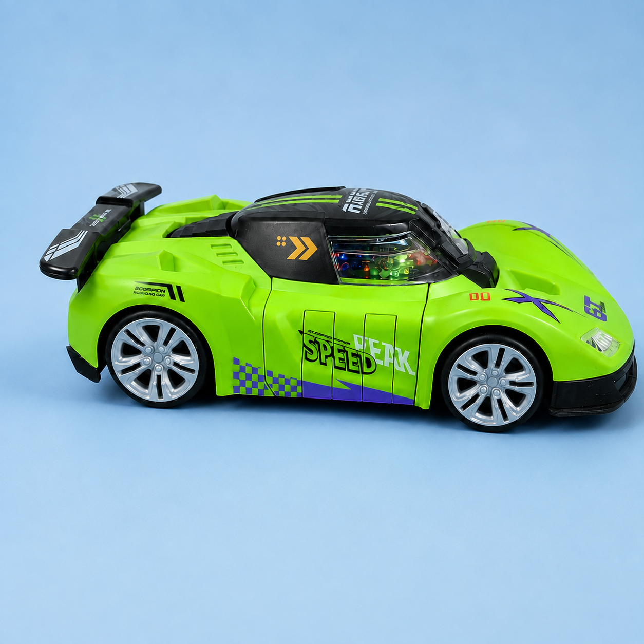 A toy model of a high-performance sports car in bright lime green and black, featuring 'SPEED' and 'MAGNUM' decals, photographed on a solid light blue background.